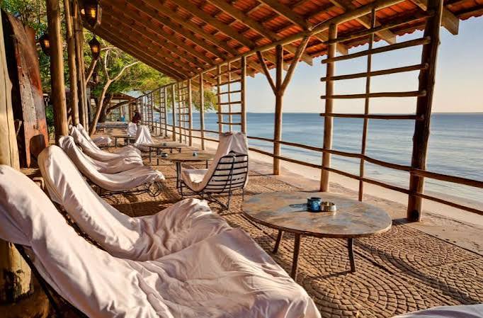 Beach lodge terrace overlooking the ocean